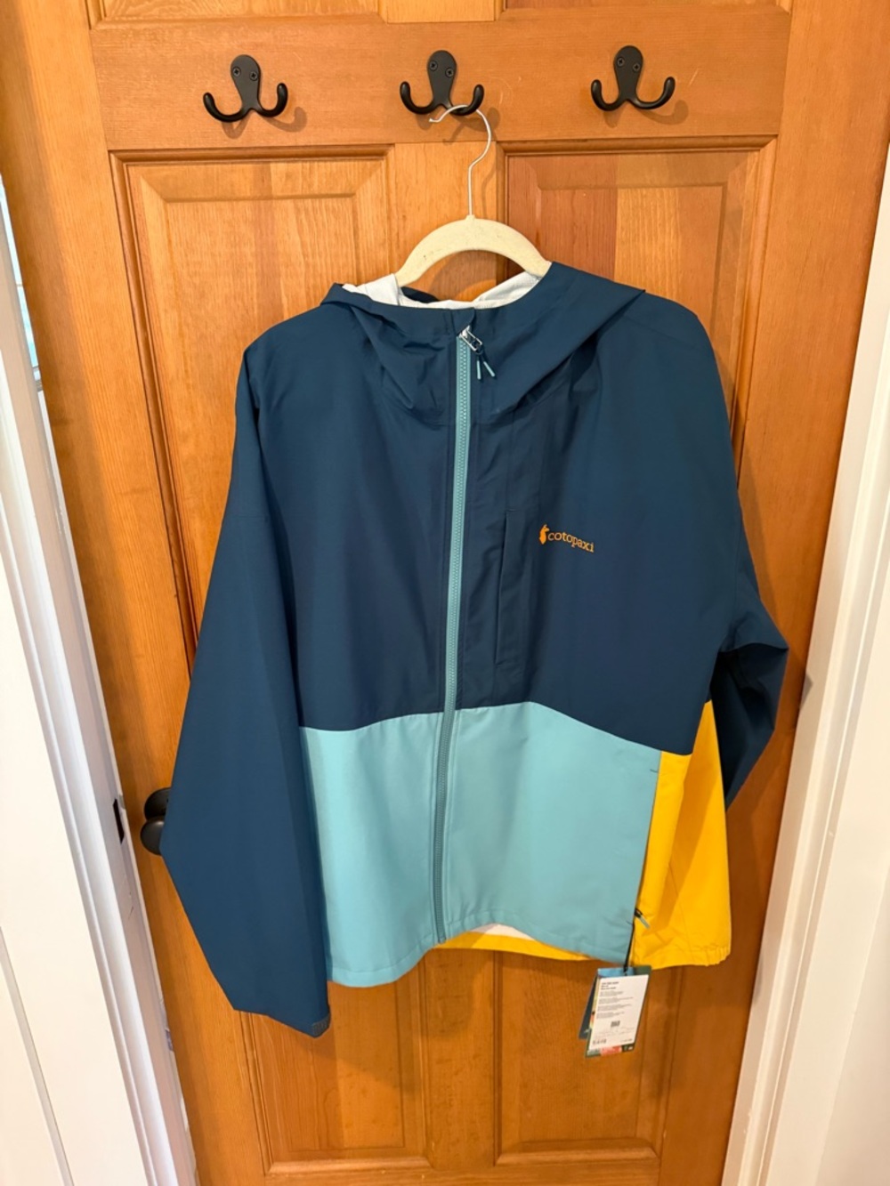 cotopaxi Colorblock Hooded Raincoat in Navy, Teal & Yellow
